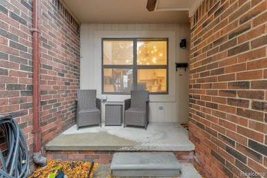 Property entrance with brick siding