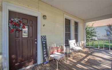 Property entrance with a porch