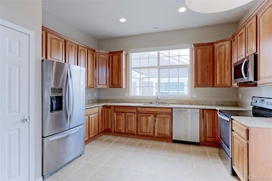 Large kitchen w/SS appliances, 42-inch maple cabinetry offers 2 lazy Susans. granite countertops, convection oven with warming drawer, pantry makes food prep & cooking a joy.