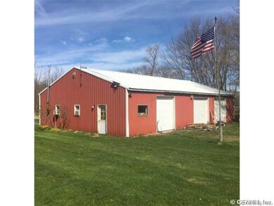 Outbuilding. 3 Bay Pole Barn