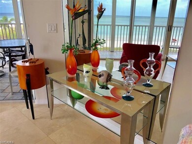 Dining room with a water view, light tile patterne