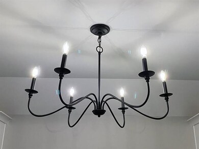 Dining area buffet is accented with dramatic moder