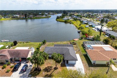 Aerial view featuring a residential view and a wat