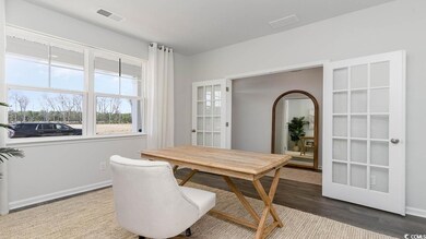 Dining space featuring wood-type flooring