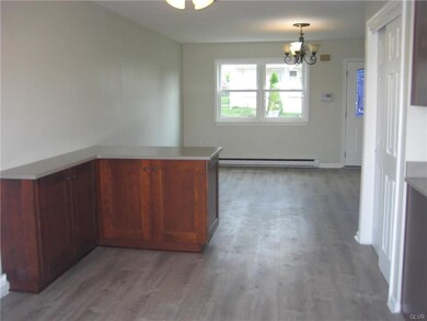 A view from the dining area in to the living room 