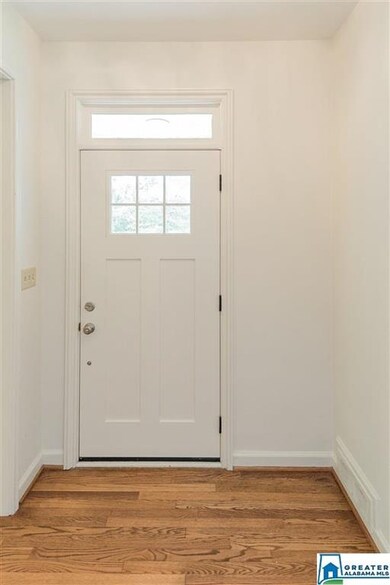 The new front door and transom allow for plenty of