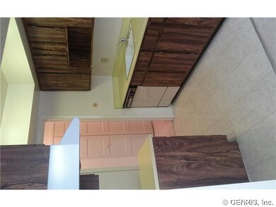 Kitchen. Galley style Kitchen. Range and refrigera
