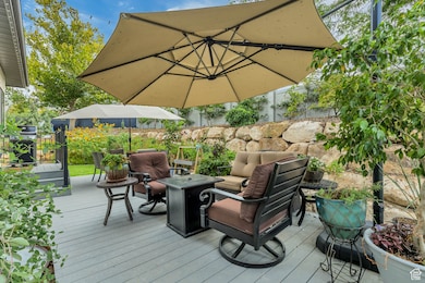 Wooden deck featuring outdoor lounge area