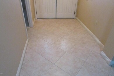 Raised baseboards & custom tile work.
