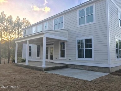 Large covered porch with patio