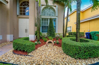 Lucious, bright front yard with immaculate curb ap