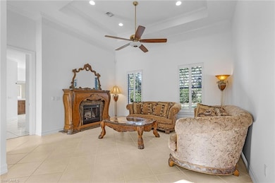 Living room with light tile patterned floors, crow