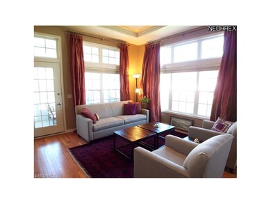 Living room with adjacent screened-in porch