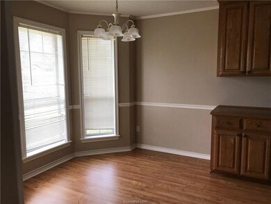 Unfurnished dining area with wood finished floors,