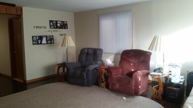 Living Room, and door to utility room.