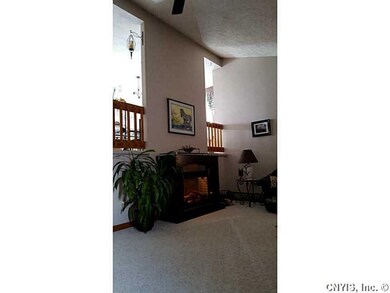 Living Room. High vaulted ceiling adds drama and n