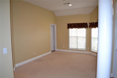The formal dining room is convenient to the kitche