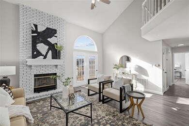 The Great Room is sure to WOW with the vaulted ceiling and magnificent brick fireplace!