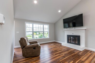 Living room with wood fireplace