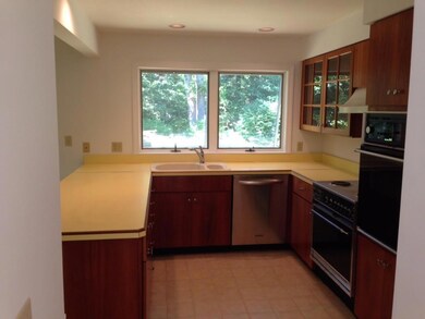 Handsome cabinetry and a large...