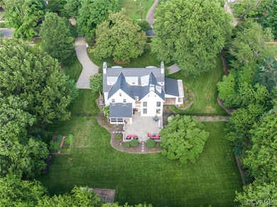 Meticulously landscaped, flat, ONE ACRE lot!