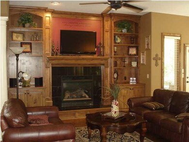 Main floor family room with built in book shelves 