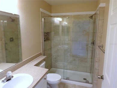 Shower featuring upgraded wall tile & niche