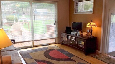 Family room and kitchen flow together as an open c