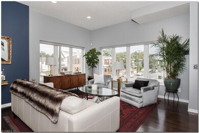 Formal Living Room has hardwood flooring, recessed