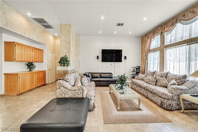 Expansive living room overlooking the pool