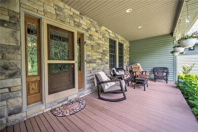 Relax and enjoy the covered front porch looking ou