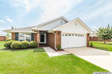 Front entry garage for easy parking. Lots of driveway space.