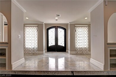 GRAND FRONT ENTRYWAY, WITH CENTRAL GATHERING ROOM,