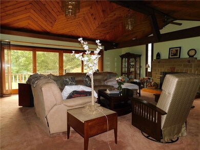 Gorgeous family room with sliders out to deck.