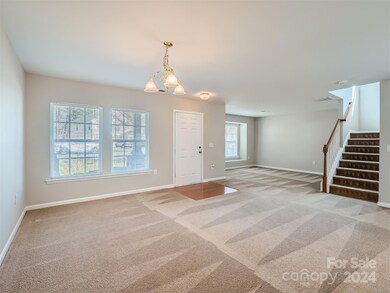 The possibilities are endless in this main level formal living area and flex space.