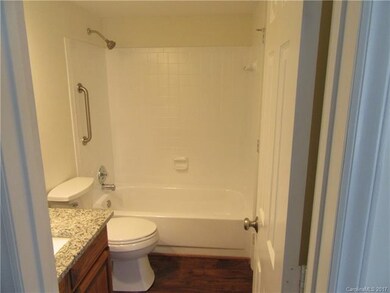 Single vanity area with privacy door to toilet and