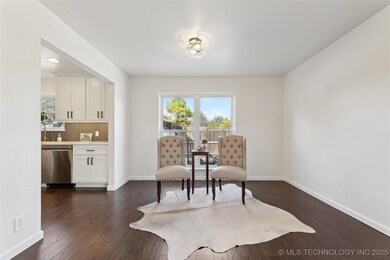 Formal dinning room open to living space and kitch