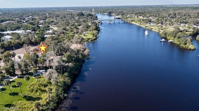 Birds eye view of property with bridge view