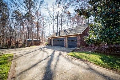 Long Driveway outlined with bricks. 3 Car Side Loa