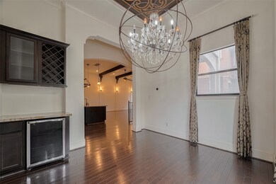 luxurious chandelier lighting up the large formal