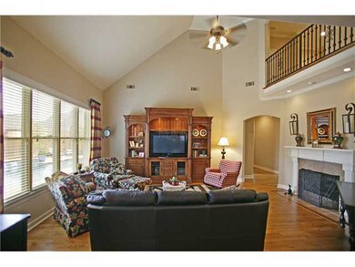 This beautiful hearthroom off the entry and kitche