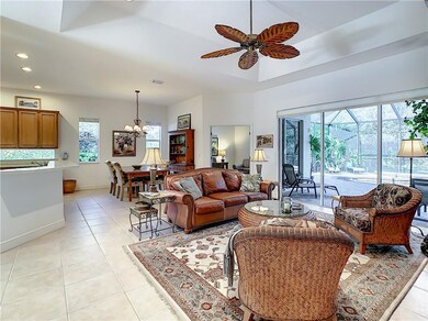 Great room with pool preserve views, open dining, 