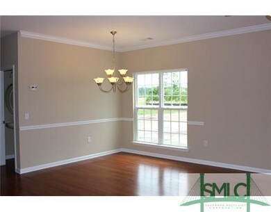 Dining Room. Bright, formal dining with hardwood f