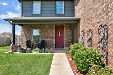 Front - landscaping, shutters, covered front porch