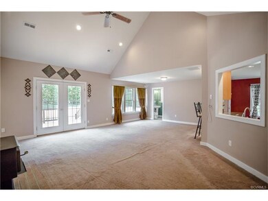 Vaulted Ceiling, Recess Lights, and Ceiling Fan in