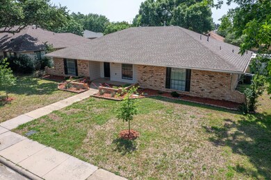 Ranch-style home with a front yard