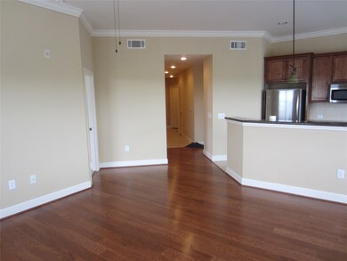 Living area opening up to kitchen