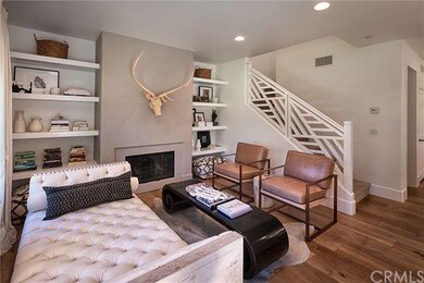 Modern remodeled staircase and new oak flooring.
