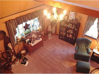 Living Room. Looking from upstairs extra sitting r