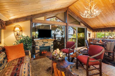 Living room with wood ceilings